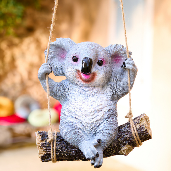 Statue de jardin «Koala sur sa balançoire»