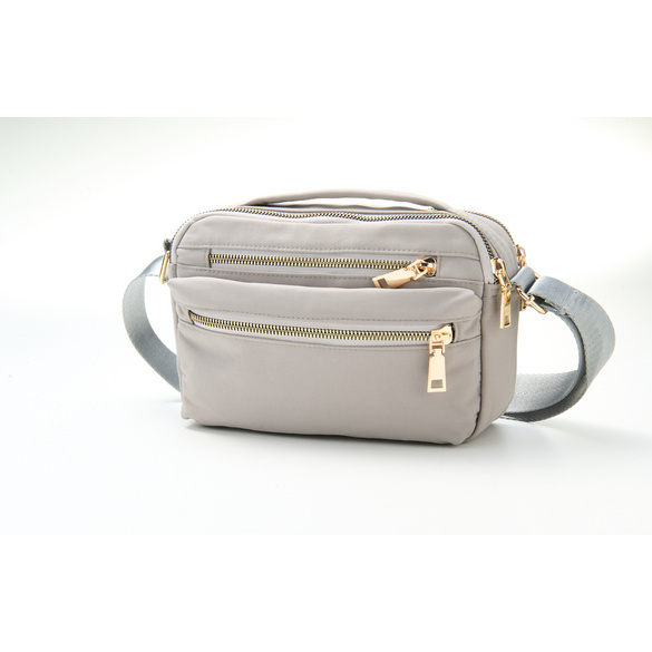 Sac à bandoulière avec 6 poches zippées, gris