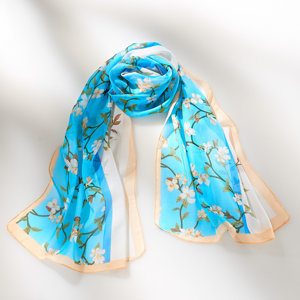 Écharpe en mousseline avec motif à fleurs bleu clair