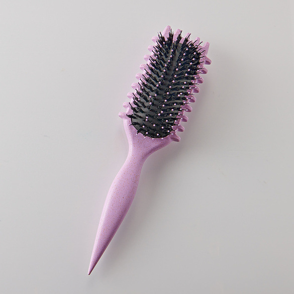 Brosse à boucler