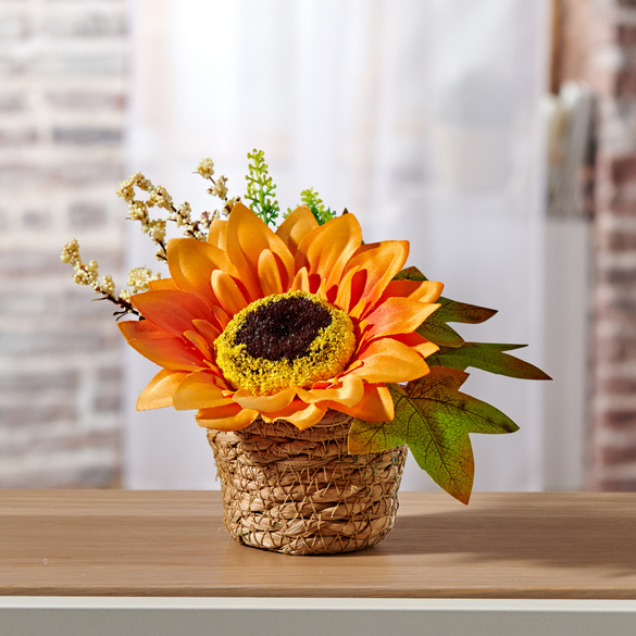 Composition florale artificielle « Tournesol » dans corbeille Eldo