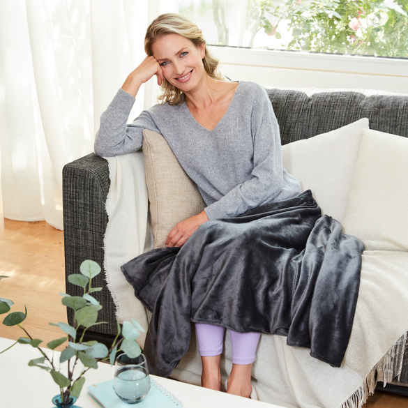 Couverture chauffante forme cape