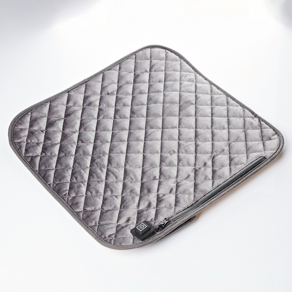 Coussin chauffant avec surface absorbante