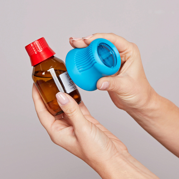 Ouvre-bouteille avec loupe 2en1