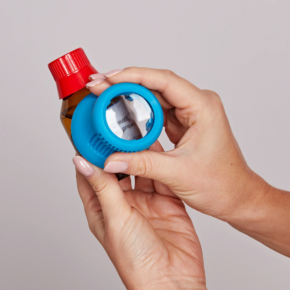 Ouvre-bouteille avec loupe 2en1