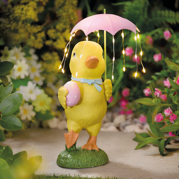 Poussin solaire avec parapluie