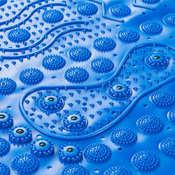Tapis de bain à surface magnétique