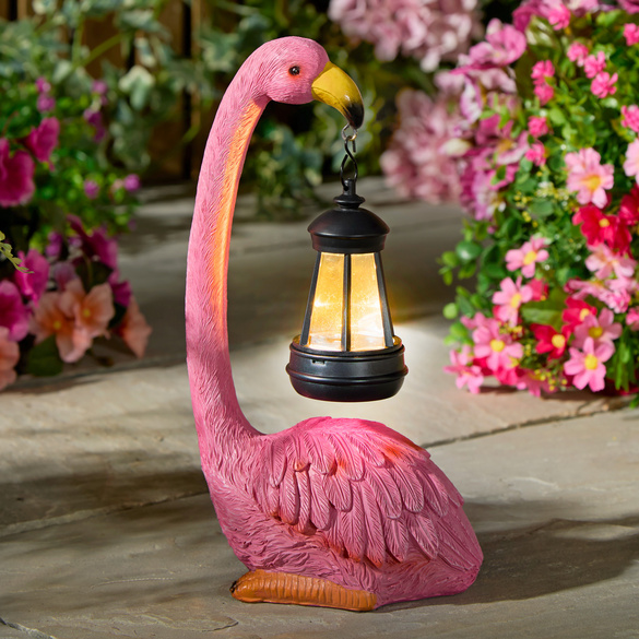 Flamant rose avec lanterne solaire