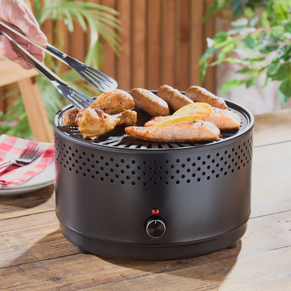 Barbecue au charbon de bois avec ventilateur