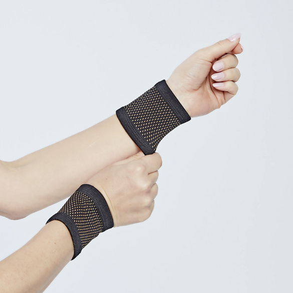 Bandage pour poignet contenant des fibres de cuivre