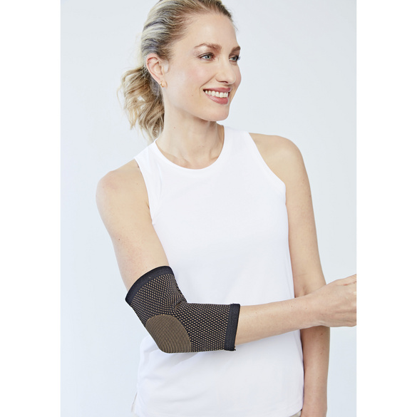 Bandage pour coude avec fibres contenant du cuivre
