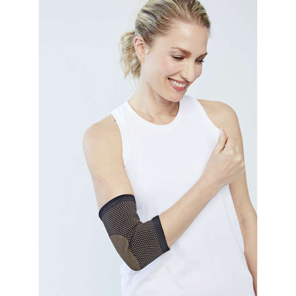 Bandage pour coude avec fibres contenant du cuivre