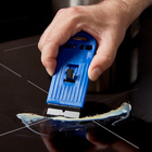 Grattoir pour plaque vitrocéramique