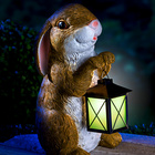 Statuette lapin avec lanterne phosphorescente