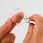 Pincette avec loupe