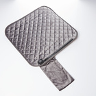 Coussin chauffant avec surface absorbante