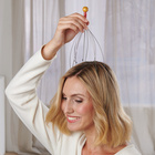 Masseur de cuir chevelu « araignée »