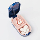 Coupe-comprimés avec boîte de rangement navy