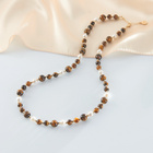 Collier en coquillage avec œil-de-tigre