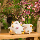 Vase avec boules en céramique