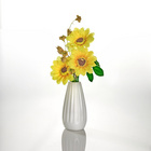 Tournesols avec vase