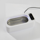 Nettoyeur à ultrasons pour lunettes