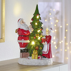 M. et Mme Noël au pied du sapin Eldo