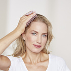 Brosse de massage pour le cuir chevelu