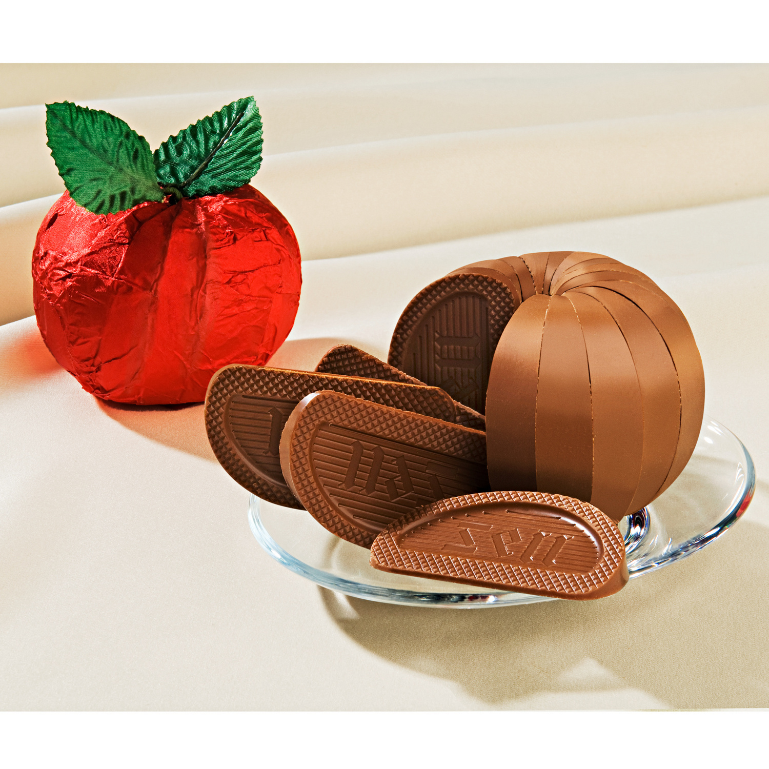 Pomme de Guillaume Tell en chocolat au lait