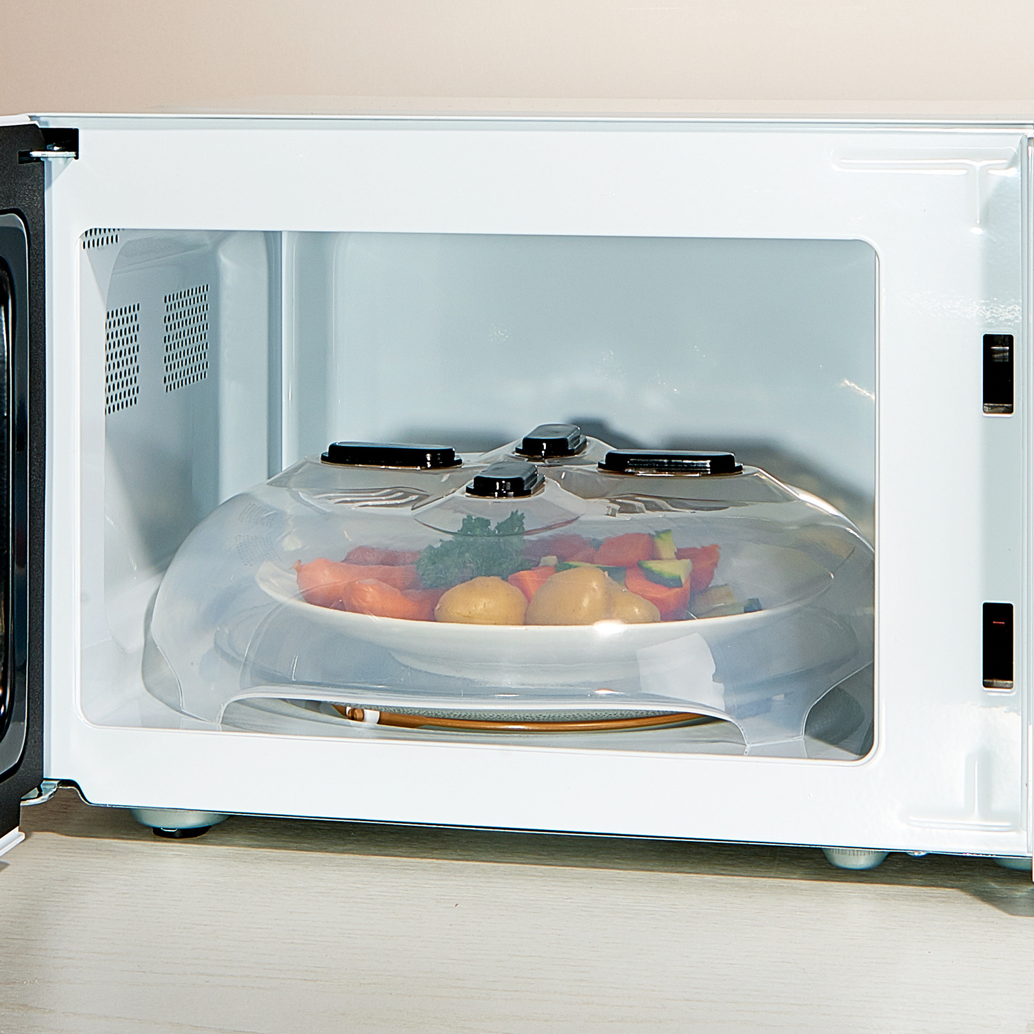 Couvercle aimanté pour micro-ondes